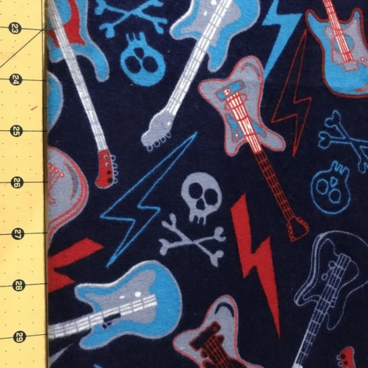 Guitars on Blue Flannel fabric Sold By The Yard #1389