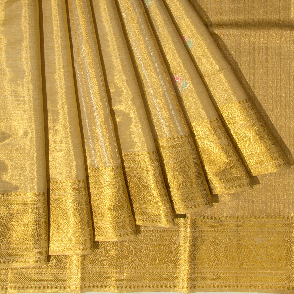 Kanchipuram Silk Tissue Vertical Lines And Butta Gold Saree