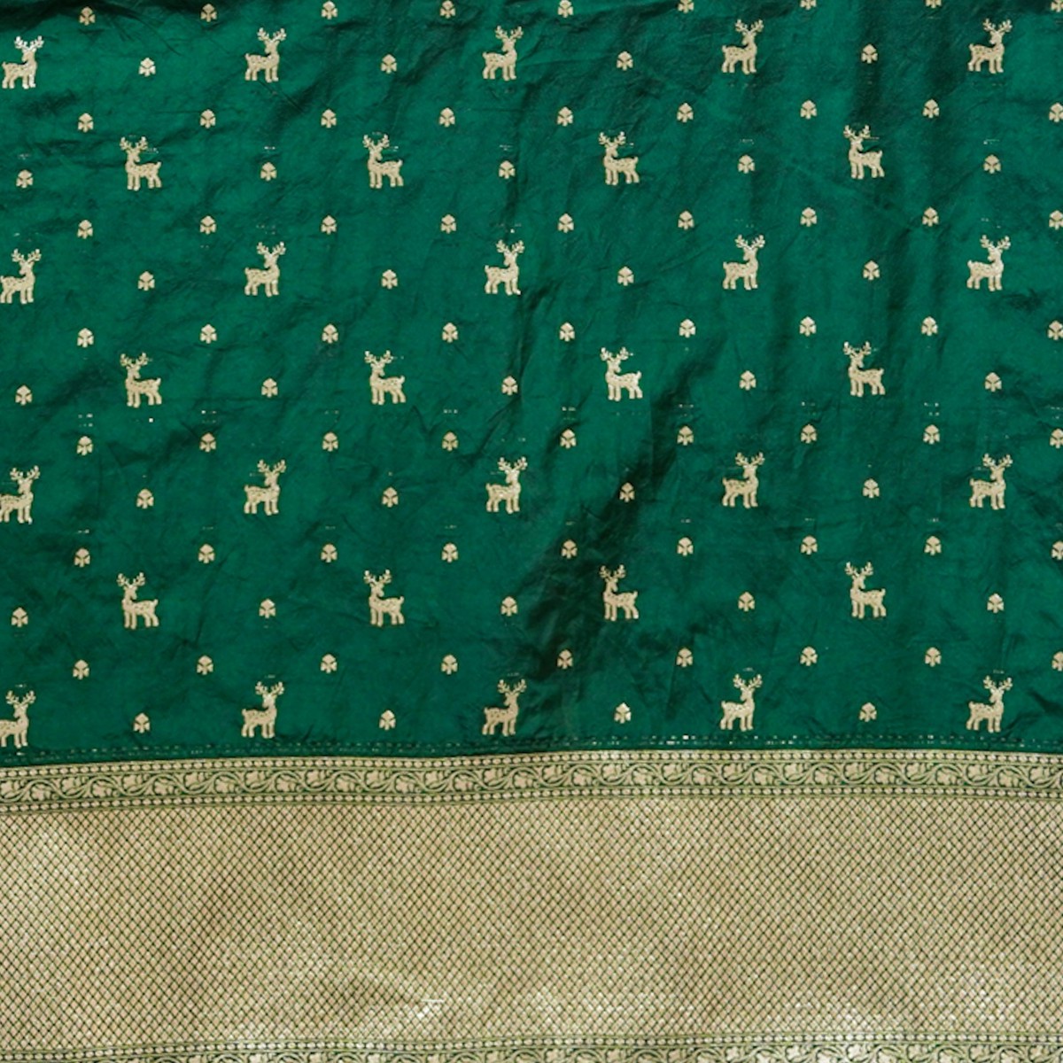 Brocade Green With deer Motif And Big Zari Border Hand Woven Fabric